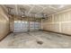 Spacious two car garage with two garage doors and room for storage, ready for your vehicles and projects at 9429 Ridgeforest Dr, Charlotte, NC 28277