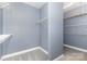 Spacious walk-in closet with wire shelving, offering ample storage and organization solutions at 9429 Ridgeforest Dr, Charlotte, NC 28277