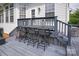 This is a beautiful deck with chairs and great view of the backyard at 10924 Owl Nest Ln, Charlotte, NC 28277
