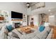 Inviting living room with fireplace, built-ins, high ceilings and lots of natural light at 10924 Owl Nest Ln, Charlotte, NC 28277