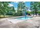 Community splash pad area featuring a waterfall feature and lounge chairs at 10924 Owl Nest Ln, Charlotte, NC 28277