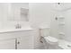 Clean bathroom with a modern vanity, toilet, and shower with white wall tiles at 1112 Concord Ave, Monroe, NC 28110