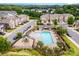High angle view of a residential community showcasing a pool, playground, and neighborhood layout at 1126 Roderick Dr, Fort Mill, SC 29708