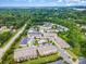 Wide aerial of the neighborhood showcasing the community pool and surrounding mature trees at 1126 Roderick Dr, Fort Mill, SC 29708