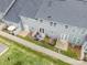 Aerial view of fenced backyards with patios, outdoor seating, and well-maintained green spaces at 1126 Roderick Dr, Fort Mill, SC 29708