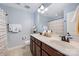 Bathroom featuring a double sink vanity, large mirror, and modern fixtures at 1126 Roderick Dr, Fort Mill, SC 29708