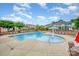 Community pool with lounge chairs, umbrellas, and a shallow splash area for  at 1126 Roderick Dr, Fort Mill, SC 29708