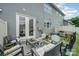 Outdoor patio featuring comfortable seating, a decorative rug, and a privacy fence at 1126 Roderick Dr, Fort Mill, SC 29708