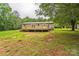 View of the deck and backyard at 1245 Forest Ridge Rd, Bessemer City, NC 28016