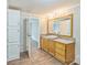 Bathroom features a wood vanity with a rectangular sink, and wood-look flooring at 1245 Forest Ridge Rd, Bessemer City, NC 28016