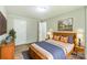 Cozy bedroom featuring hardwood floors, neutral walls, and coordinated furnishings at 1245 Forest Ridge Rd, Bessemer City, NC 28016