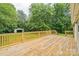 Expansive wooden deck perfect for outdoor entertaining overlooking a private backyard at 1245 Forest Ridge Rd, Bessemer City, NC 28016