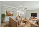 Comfortable living room with hardwood floors, cozy furniture, and view to dining area at 1245 Forest Ridge Rd, Bessemer City, NC 28016