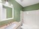 This bathroom features neutral countertops and a shower-tub combo at 12529 Old Timber Rd, Charlotte, NC 28269