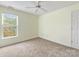 Bedroom featuring plush carpet, natural light, and neutral walls at 12529 Old Timber Rd, Charlotte, NC 28269