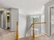 Well-lit landing boasts natural light and carpet flooring at 12529 Old Timber Rd, Charlotte, NC 28269