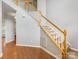 Carpeted staircase with wood railing at 12529 Old Timber Rd, Charlotte, NC 28269