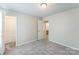 Bright bedroom with plush carpet and walk-in closet at 13413 Golden Apple Ct, Charlotte, NC 28215