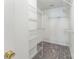 Spacious walk-in closet provides ample storage with built-in shelving units at 13413 Golden Apple Ct, Charlotte, NC 28215