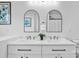 Sleek bathroom with a double vanity, black hardware, and modern lighting creates a functional and stylish space at 1377 Beagle Run, Salisbury, NC 28146