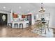 Open-concept kitchen with a breakfast bar, stainless steel appliances, and hardwood floors at 1377 Beagle Run, Salisbury, NC 28146