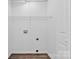Laundry room with a shelf and hookups for a washer and dryer at 1377 Beagle Run, Salisbury, NC 28146