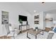 Cozy living room featuring stylish decor, a comfortable chair, and modern furnishings at 1377 Beagle Run, Salisbury, NC 28146