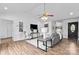 Bright living room featuring vaulted ceilings, modern furniture, and stylish decor at 1377 Beagle Run, Salisbury, NC 28146