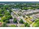 Aerial view showcases community layout, landscaping, and convenient street parking at 1556 Walnut View Dr, Charlotte, NC 28208
