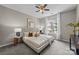 Inviting bedroom with soft carpet, a ceiling fan, and natural light at 1556 Walnut View Dr, Charlotte, NC 28208