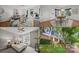 A composite image featuring the living room, dining room, bedroom, and exterior of the home at 1556 Walnut View Dr, Charlotte, NC 28208