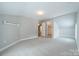 Neutral bedroom with ample space and a large closet, perfect for comfortable living and storage at 2021 Charlotte Dr, Charlotte, NC 28203