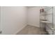 Walk-in closet for organized storage and convenience, featuring carpet floors and wire rack shelving at 2021 Charlotte Dr, Charlotte, NC 28203