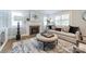 Cozy living room with a plush rug, fireplace, and comfortable couch, perfect for relaxing and unwinding at 2021 Charlotte Dr, Charlotte, NC 28203
