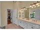 Bright bathroom with double sinks, ample cabinet space, and a separate shower and tub, offering a spa-like experience at 2030 Fasana Rd, York, SC 29745