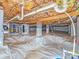 Crawl space featuring water heaters and vapor barrier at 211 Drive Inn Rd, Locust, NC 28097
