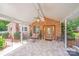 Inviting covered front porch with a fan and outdoor seating area, perfect for relaxing at 211 Drive Inn Rd, Locust, NC 28097
