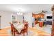 Charming dining area leading into the updated kitchen with stainless steel appliances at 211 Drive Inn Rd, Locust, NC 28097