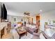 Comfortable living space with a fireplace, hardwood floors, and an open floor plan at 211 Drive Inn Rd, Locust, NC 28097