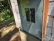 Weathered outdoor electrical panel with multiple circuit breakers at 211 Putnam St, Shelby, NC 28152