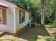 Exterior view of house featuring brown shutters and an AC unit at 211 Putnam St, Shelby, NC 28152