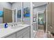 Bathroom features double vanity with quartz countertops and modern fixtures, exuding comfort at 224 Wendover Heights Cir, Charlotte, NC 28211