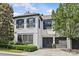 Charming two-story home with well-manicured landscaping, a two-car garage, and stylish black shutters at 224 Wendover Heights Cir, Charlotte, NC 28211