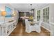 Open concept kitchen with adjacent dining area, granite countertops, and stainless appliances at 224 Wendover Heights Cir, Charlotte, NC 28211