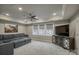 Relaxing bonus room with plush carpeting, large window, and decorative media center for entertainment and leisure at 2593 Las Brisas Ln, Denver, NC 28037