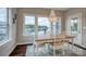 Charming dining area with lake views and an elegant chandelier at 2593 Las Brisas Ln, Denver, NC 28037