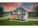Charming waterfront home with inviting front porch and manicured lawn at 2593 Las Brisas Ln, Denver, NC 28037