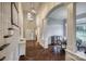 Grand foyer featuring high ceilings, an arched doorway, and exquisite hardwood floors at 2593 Las Brisas Ln, Denver, NC 28037