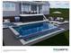 A luxurious backyard pool is adjoined by a seating area and an outdoor kitchen with bar seating above at 2593 Las Brisas Ln, Denver, NC 28037