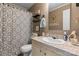 Well-lit bathroom with decorative shower curtain and decor at 2843 Hopewell Church Rd, Sherrills Ford, NC 28673